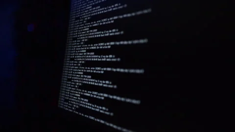 Close up of code on a screen in a server room 스톡 동영상 287407416