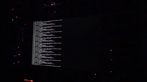 Close up of code on a screen in a server room 스톡 동영상 287407645