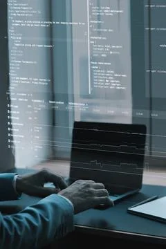 Close-up of coding interface projected over workspace. Fictional programming 写真素材