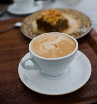Close up on coffee with Apple cake on background 스톡 사진