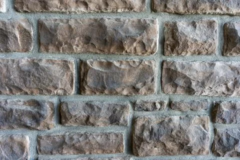 Close-Up of Coffee Bean Limestone Wall Texture with Natural Stone Masonry Stock Photos