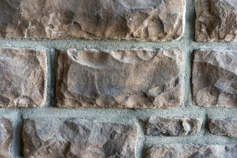 Close-Up of Coffee Bean Limestone Wall Texture with Rustic Natural Stone Pa.. Stock Photos