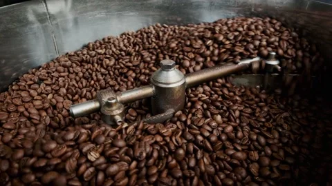 Close-up of a coffee bean mixer during the roasting process Stock Footage 132333732