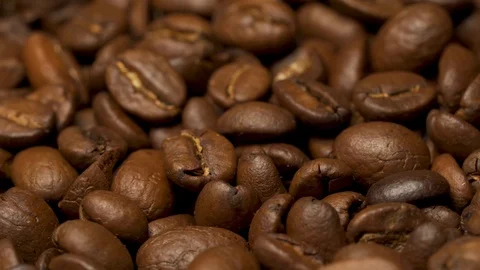 Close up coffee beans are roasted and rotated clockwise. Vídeos de archivo 128338137