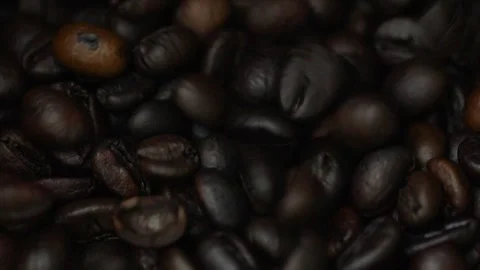 Close-up of coffee beans being poured. Stock Footage 301674385
