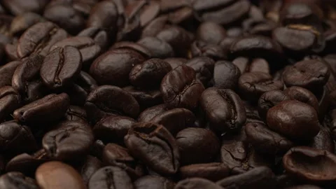 Close-up of coffee beans. Coffee beans and raw coffee. Stock Footage 221154198