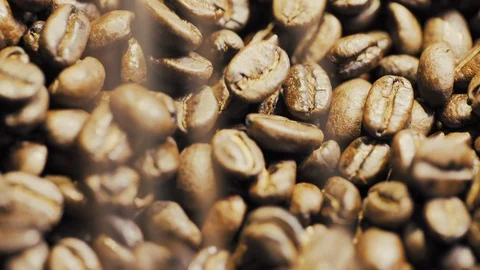 Close-Up of Coffee Beans Falling and Piling Up Stock Footage 129304434
