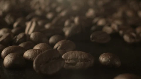 Close up of coffee beans falling down 스톡 동영상 87731351