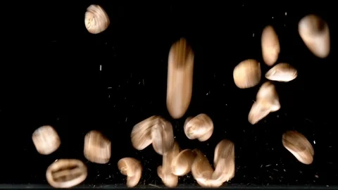 Close-up Coffee Beans falling down on table Stock Footage 122010959