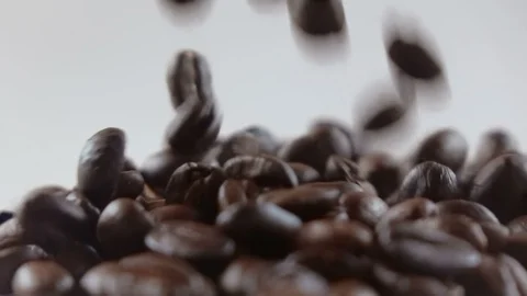Close up coffee beans falling slow motion Stock Footage 102216513