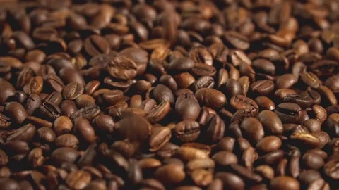 Close-up of coffee beans falling in slow motion Stock Footage 307615714