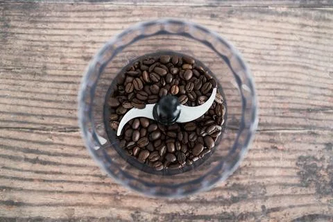 Close-up of coffee beans food processor about to get grinded, simple ingredie Stock Photos
