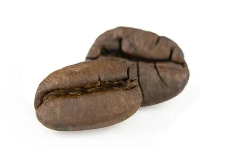 Close up coffee beans isolated on white background with clipping path. Stock Photos