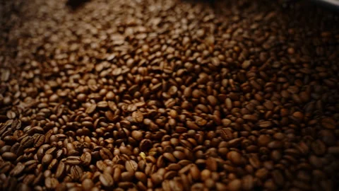 Close up of coffee beans in roaster Stock Footage 275896515
