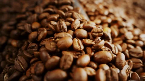 Close up of coffee beans in roaster Stock Footage 275896942