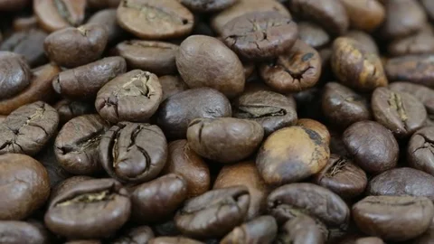 Close up of coffee beans. Rotates plate with coffee beans Stock Footage 76440705