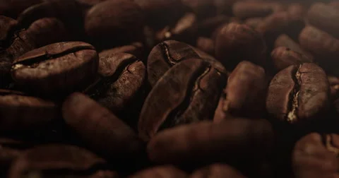 Close up of coffee beans rotating - Looping Stock Footage 61498900