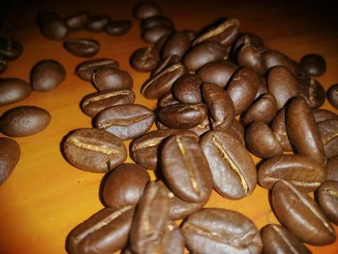 Close-up of coffee beans on table Stock Photos