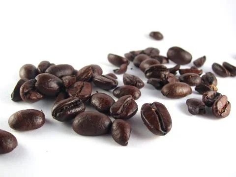 Close up of coffee Beans on white background Stock Photos