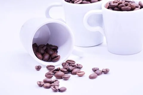 Close-up of coffee beans on white background Stock Photos