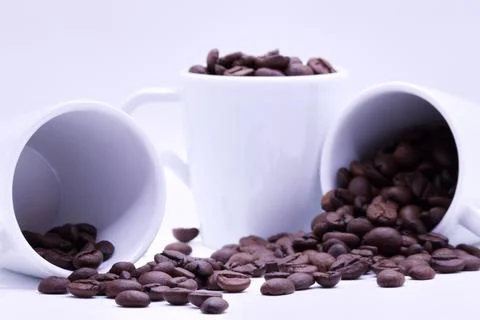 Close-up of coffee beans on white background Stock Photos
