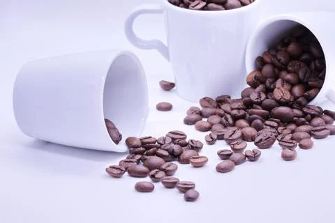 Close-up of coffee beans on white background Stock Photos