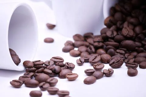 Close-up of coffee beans on white background Stock Photos