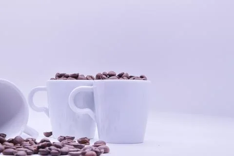 Close-up of coffee beans on white background Stock Photos