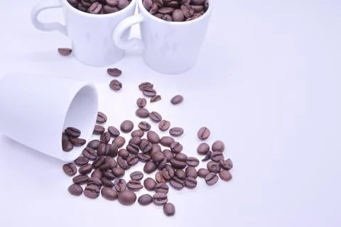 Close-up of coffee beans on white background Stock Photos