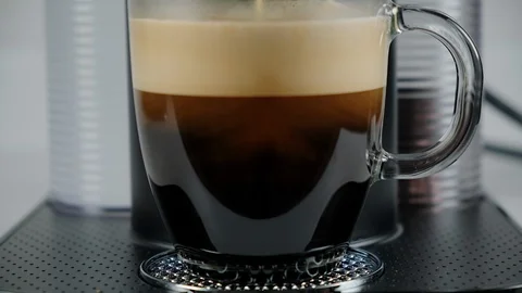 Close up of coffee being brewed in to a cup. Stock Footage 100654238