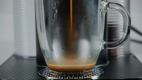 Close up of coffee being brewed in to a cup. Stock Footage 100654500