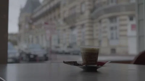 Close up coffee cup view from inside a coffee shop. Normandy. Video 4K Stock Footage 259826648