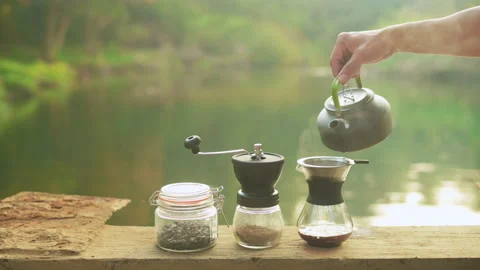 Close up coffee drip over nature background , relax travel concept. Stock Footage 146128024