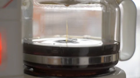Close-up of coffee dripping in coffee machine Stock Footage 86893243