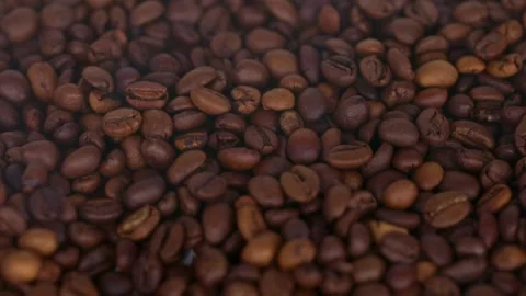 Close up of coffee grains with smoke Stock Footage 201130045