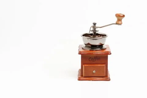 Close up coffee grinder on white background. Fotos Stock