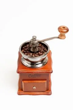 Close up coffee grinder on white background. Fotos Stock