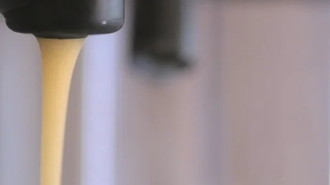 Close up of Coffee Machine Dispensing Coffee Stock Footage 124124737
