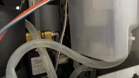 Close up of coffee machine internal system with tubes and water flow, Stock Footage 337116938