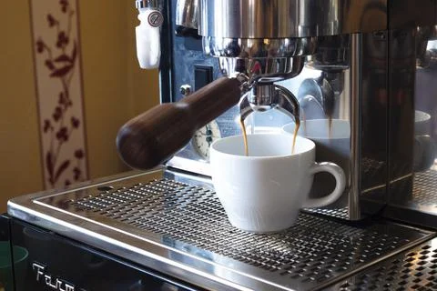 Close up of coffee machine making coffee. Stock Photos