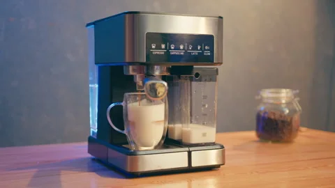 A Close-Up of a Coffee Machine Making a Fresh Latte Video stock 283463148