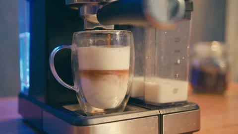 Close-Up of Coffee Machine Making a Latte Video stock 283452202