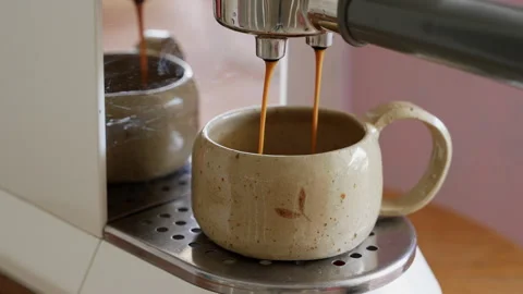 Close up of coffee machine pouring espresso drink Stock Footage 255033331