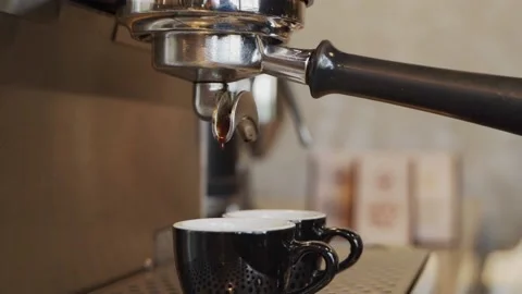 Close up coffee maker machine with black coffee cup. Coffee machine prepares. Co Stock Footage 159401795