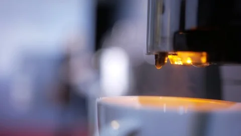 Close-up of coffee pouring from coffee machine. Professional coffee brewing 動画素材 103542401