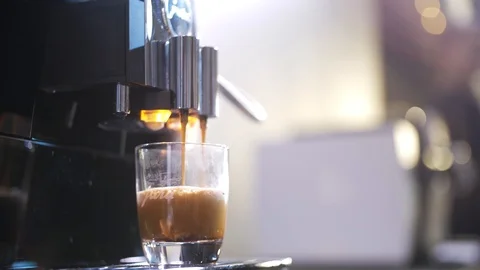 Close-up of coffee pouring from coffee machine. Professional coffee brewing 動画素材 103542417