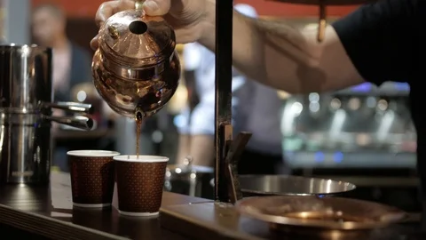 Close-up of coffee pouring from coffee machine. Professional coffee brewing 動画素材 103542420