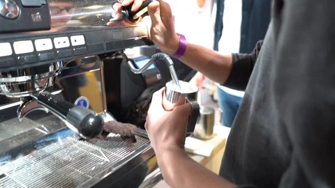 Close-up of coffee pouring from coffee machine. Professional coffee brewing Stock Footage 103542432