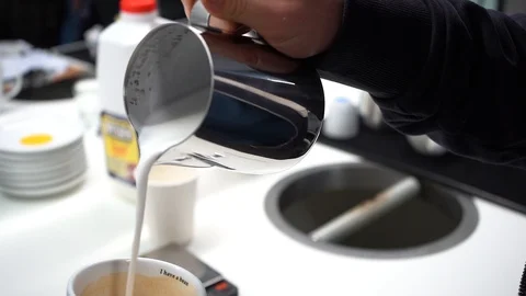 Close-up of coffee pouring from coffee machine. Professional coffee brewing 動画素材 103542438