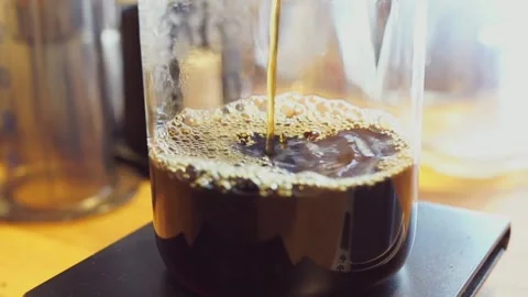 Close up coffee pouring espresso cup automatic caffeine brew dark service in 4k Stock Footage 336561907